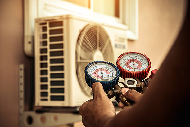 Professional Air Conditioning Service technician working in Kamas, UT